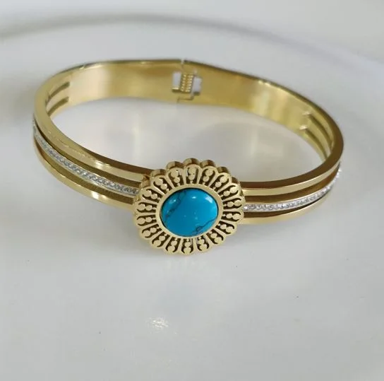 women’s solitaire diamond engagement rings-women’s gift bracelet-Tarohi Jewels Stainless Steel Gold Plated Turquoise Floral Shaped Kada- STKD 4847