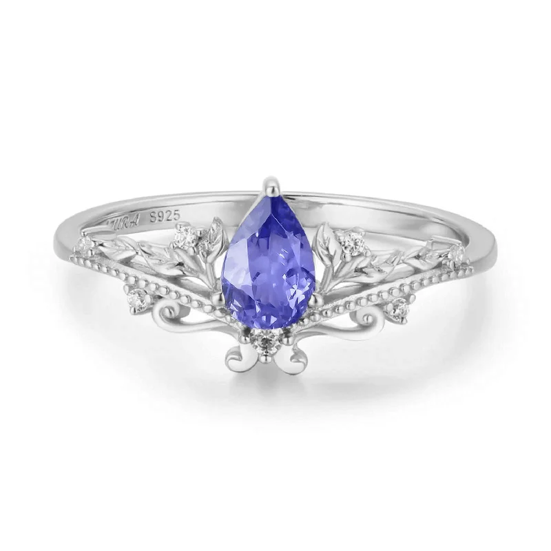 women’s carved ring-Lotus Tanzanite Ring©