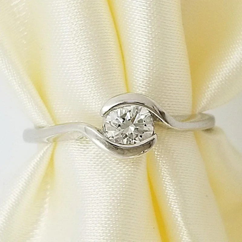 White Gold Diamond Ring with a Hug