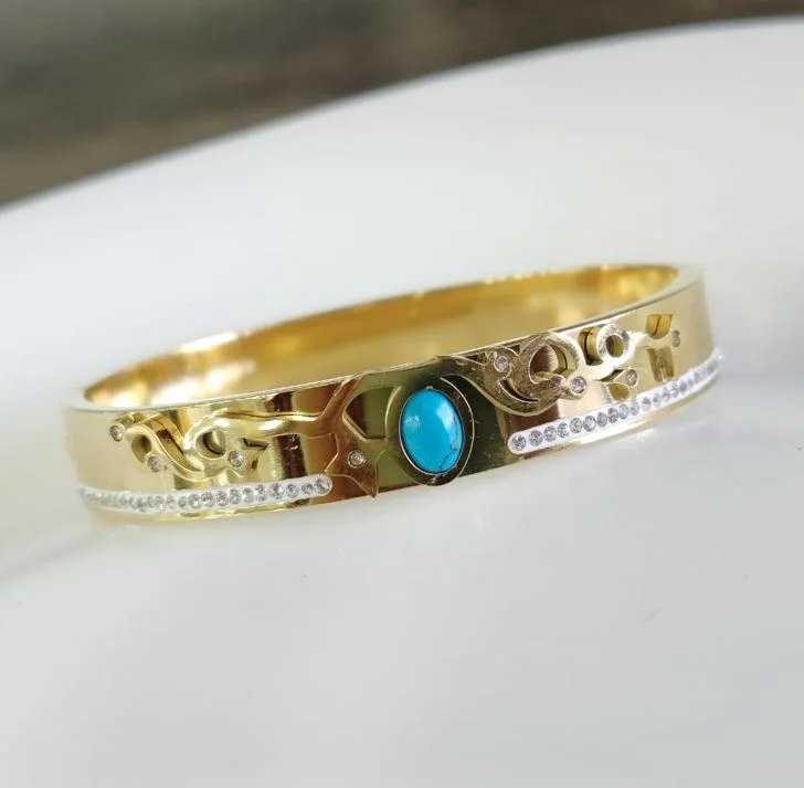 women’s engagement rings with colored diamonds-women’s fine bangle-Tarohi Jewels Stainless Steel Gold Plated Turquoise Oval Shaped Kada- STKD 4849